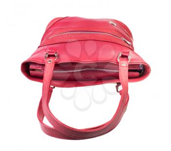 closed red handbag with top zipper handmade from natural leather isolated on white background