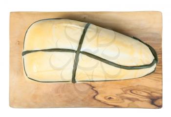 top view of local italian Provola Affumicata (smoked provola) cheese on olive wood cutting board isolated on white background