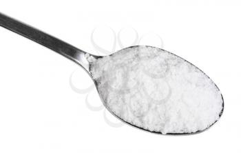 top view of teaspoon with grained Rock Salt close up isolated on white background