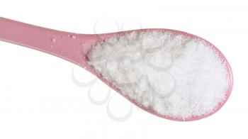 top view of ceramic spoon with fine ground Sea Salt close up isolated on white backgrou