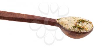 wooden salt spoon with seasoned salt with dried vegetables and flavours close up isolated on white background