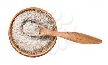 top view of wooden salt cellar with spoon with seasoned salt with spices and dried herbs isolated on white background