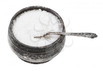 old silver salt cellar with spoon with grained Rock Salt isolated on white background