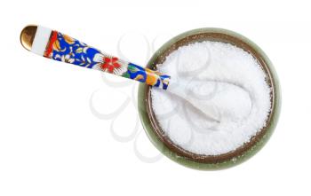 top view of ceramic salt cellar with spoon with fine ground Sea Salt isolated on white background