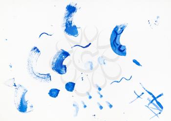 abstract brush strokes by blue paint handpainted by watercolours on white paper