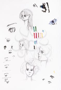 sketches of girl's heads and eyes hand-drawn by black pencil and felt pens on white paper