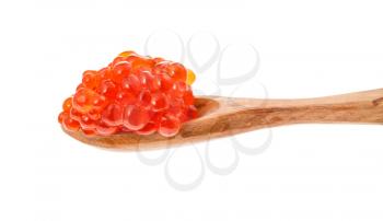 side view of little wooden spoon with salted russian red caviar of sockeye salmon fish isolated on white background