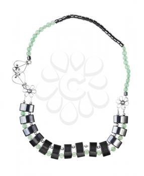 top view of hand crafted necklace from green jade, black hematite and silver beads isolated on white background