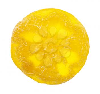 top view of handmade yellow translucent round soap with Luffa plant isolated on white background