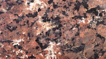 panoramic background from polished natural Urtite rock close up