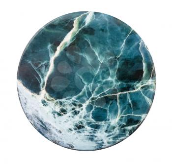 polished circle from natural Ophite (serpofite, serpentine) rock isolted on white background