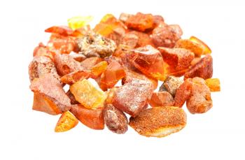 pile of raw Amber nuggets isolated on white background