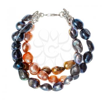 top view of hand crafted bracelet from three stings of colored river pearls isolated on white background
