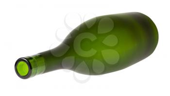 lying empty green brandy bottle isolated on white background