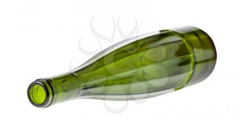lying empty faceted green wine bottle isolated on white background