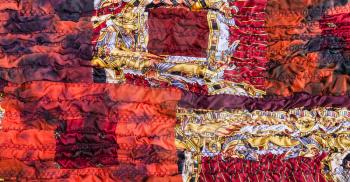 ornament of stitched crumpled red brown patchwork scarf