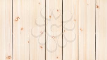panoramic wooden background - unpainted wood board from vertical narrow pine planks