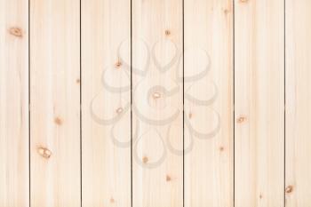 wooden background - unpainted wood panel from vertical narrow pine planks