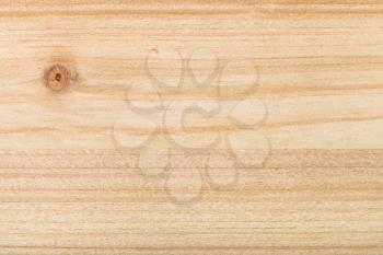 horizontal wooden background - unpainted pine plank with knot close up