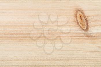 horizontal wooden background - unpainted pine plank with wood pattern and knot close up