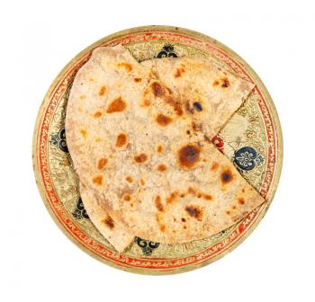 Indian cuisine - top view of tandoori roti (naan flatbread baked in tandoor ) on brass plate isolated on white background