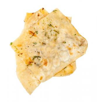 Indian cuisine - pieces of garlic naan (garlicky flatbread) isolated on white background