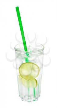 gin tonic cocktail in highball glass with two slices of lime, cubes of ice and green plastic straw isolated on white background