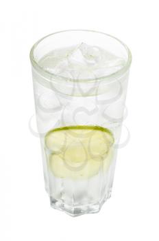 gin and tonic cocktail in highball glass with two slices of lime and ice cubes isolated on white background