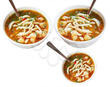 set of central asian Laghman soups in white bowl isolated on white background