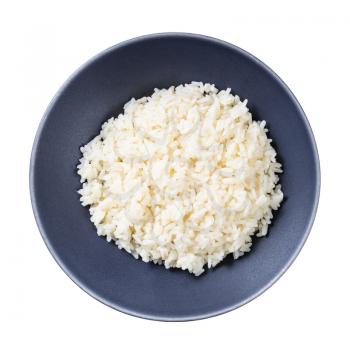 top view of boiled parboiled rice in gray bowl isolated on white background
