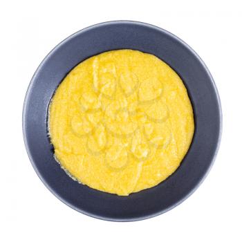 top view of cooked polenta in gray bowl isolated on white background