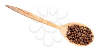 top view of grains of paradise pepper in wood spoon isolated on white backgrouns