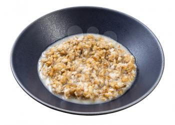 cooked porridge from wholegrain oat in gray bowl isolated on whitte background