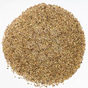 top view of pile of Ajwain seeds on gray ceramic plate