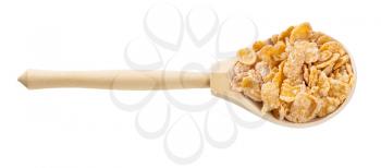 wooden spoon with sugar coated cornflakes isolated on white background