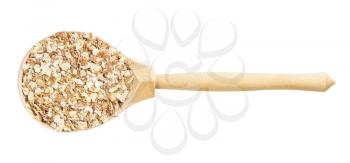 top view of wood spoon with oat flakes with rye bran isolated on white background