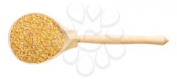top view of wood spoon with crushed polished wheat grains isolated on white background