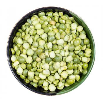 top view of raw dried green split peas in round bowl isolated on white background
