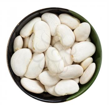 top view of raw lima beans in round bowl isolated on white background