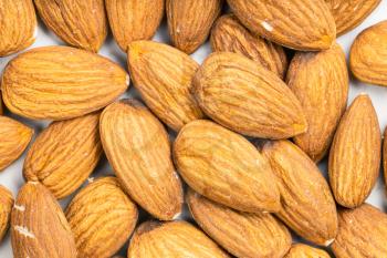 food background - many raw almond seeds