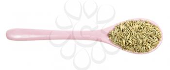 top view of ceramic spoon with anise seeds isolated on white background