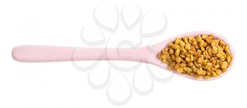 top view of ceramic spoon with fenugreek seeds isolated on white background