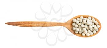 top view of wood spoon with white pepper peppercorns isolated on white background