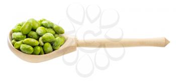 frozen Edamame (unripe soybeans) in wooden spoon isolated on white background