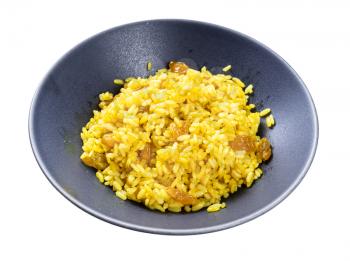 cooked sweet yellow rice porridge with turmeric and raisins from parboiled rice isolated on white background
