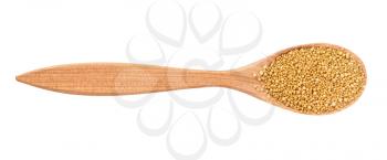 top view of granulated dried yeast in wood spoon isolated on white background