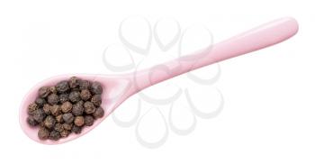 top view of hainan black pepper in ceramic spoon isolated on white backgrouns