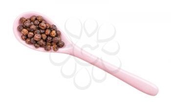 top view of red kampot pepper in ceramic spoon isolated on white backgrouns