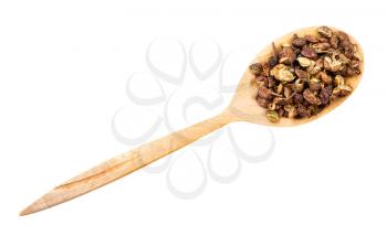 top view of dried pink sichuan pepper in wood spoon isolated on white backgrouns