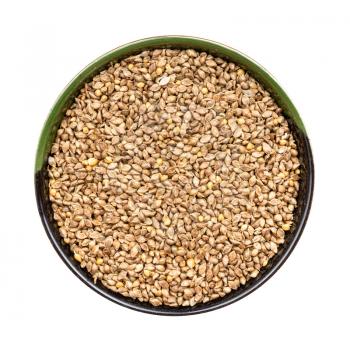top view of whole-grain barnyard millet seeds seeds in round bowl isolated on white background